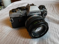 Olympus OM10 35mm SLR Film Camera + Zuiko 50mm F1.8 Lens + Manual Adapter + Case