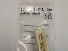 Seven small rectangular TT-221 C2 carbide inserts in clear plastic packaging, labeled “Made in U.S.A.”