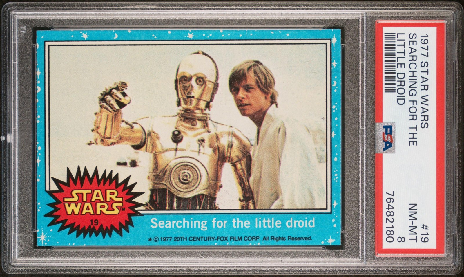 1977 Topps Star Wars #19 Searching for the little droid PSA 8