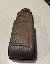 antique Barler's cast iron wall-mounted shoe shine box.