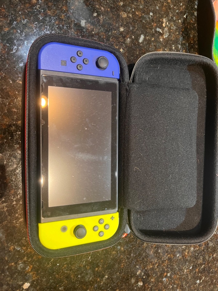 Used Nintendo Switch with Games, Controllers, Cases, and Chargers