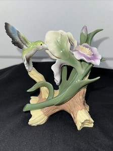Glazed Porcelain Hummingbird On Iris To Mimick Drinking Nectar From The Iris