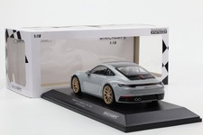 Cerchi 1:18 Minichamps Porsche 911 992 Carrera 4S 2023 gesso/oro 300 pz
