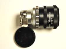 Asahi microscope adapter with the M42 mount. With cap.