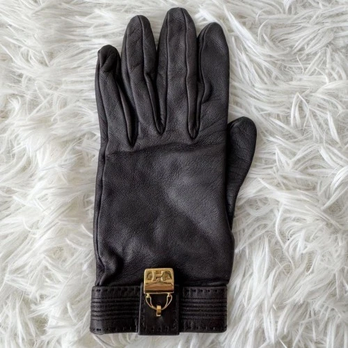 HERMÈS Guanti pelle HERMES marrone scuro Kelly Constance oro charm usati senza scatola