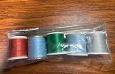 5 spools partial thread colors rust 2 light blue green gray 1" X 1"
