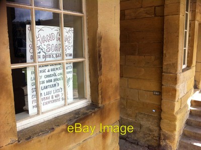 Foto 6x4 Lebensmittelhändler Apostrophe - Schild in einer Einheit in Piece Hall Halifax c2011
