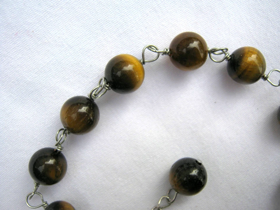 Tobillera estilo taza de hojalata de 8"-10" con ojo de tigre marrón y plata de ley Foto 2 de 4