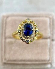 2Ct Oval Cut Lab-Created Blue Sapphire 14K Yellow Gold Plated Halo Wedding Ring