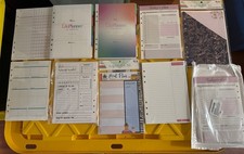 an Erin Condren planner kit containing colorf...