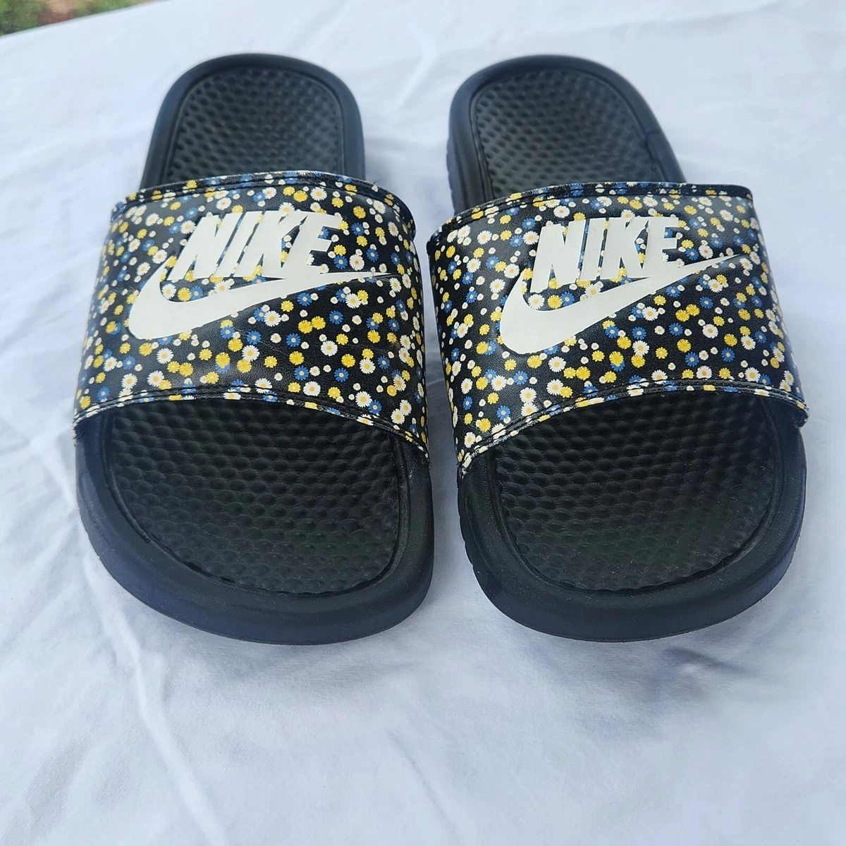 Nike black sales floral slides