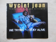 Wyclef Jean "The Fugees" Autograph Signed CD Cover "We Trying To Stay Alive"