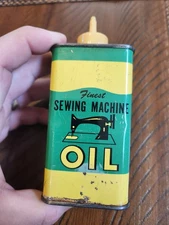 Vintage Finest Sewing Machine Oil Can. Green and yellow very nice