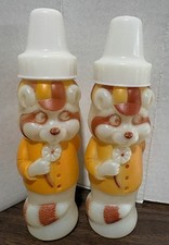 2- Vintage 70 s Evenflo Raccoon Baby Bottle, Plastic Blow Mold.
