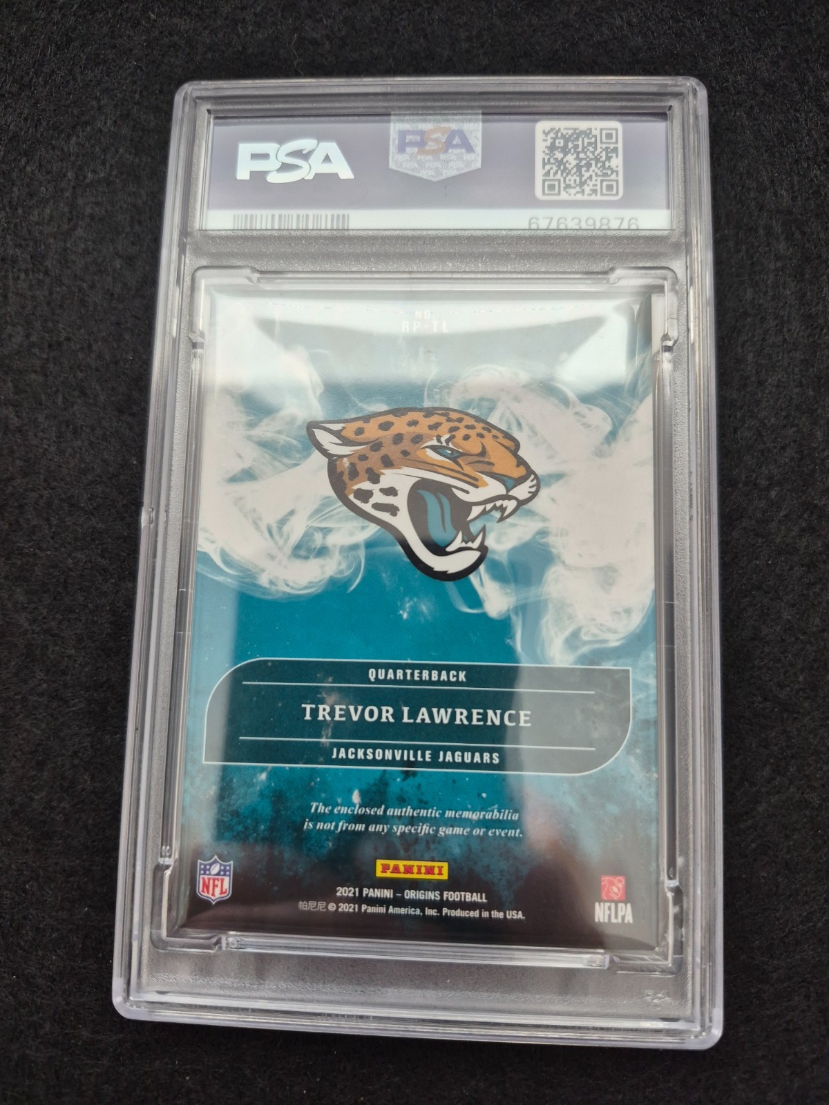 2021 Panini Origins - Rookie Patches Red #RP-TL Trevor Lawrence /199 PSA 7 view 2