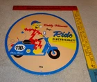 VINTAGE 56 REDDY KILOWATT ELECTRIC SCOOTER 11 3/4" PORCELAIN METAL GASOLINE SIGN