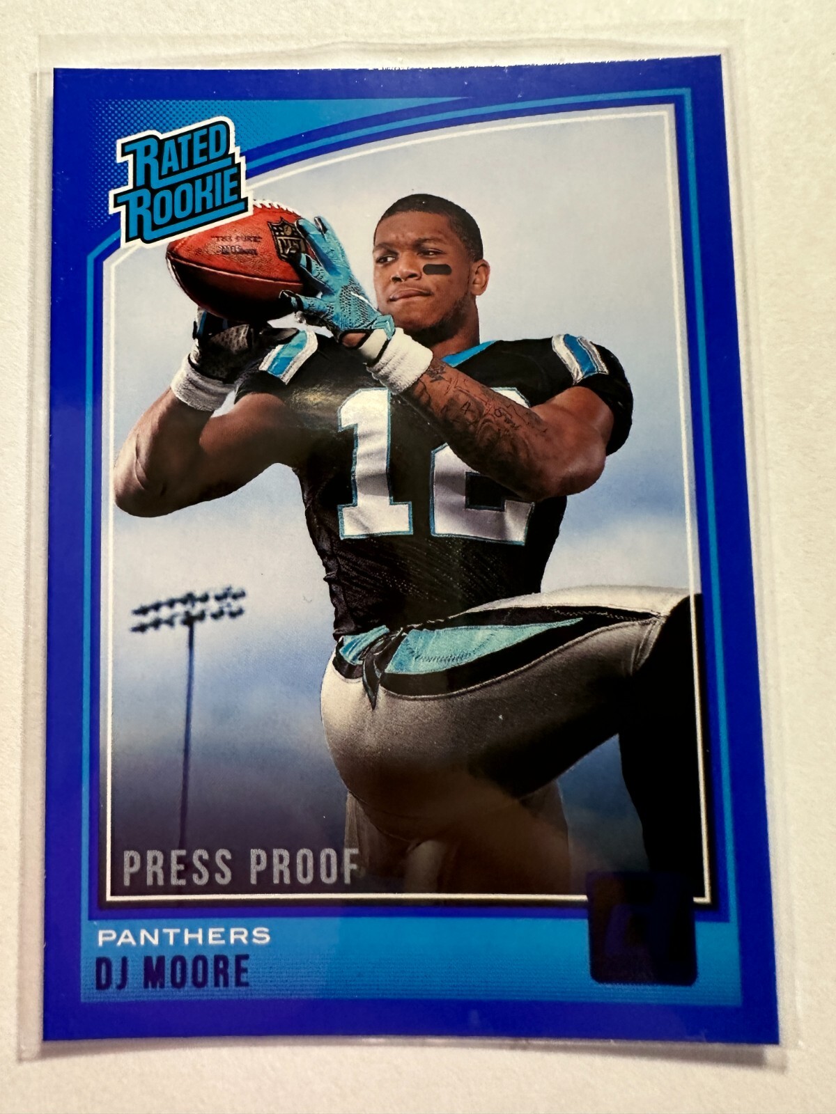 K20,520 - 2018 Donruss Press Proof Blue #316 D.J. Moore RR