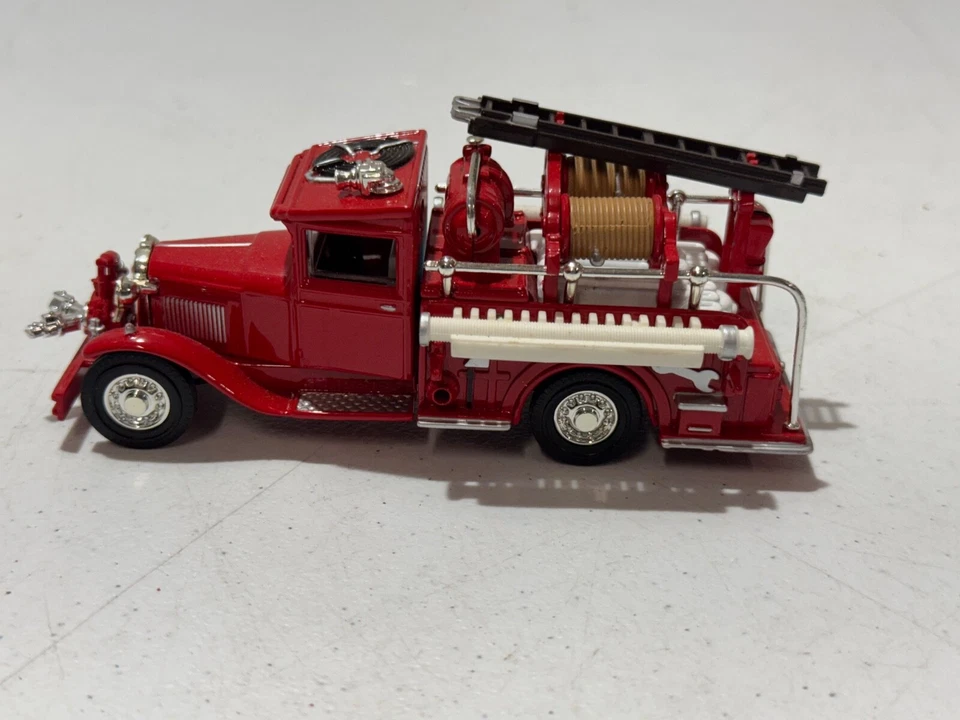 Camión de bomberos Ford AA 1932 Matchbox YFE06, de colección 1991 Foto 3 de 4