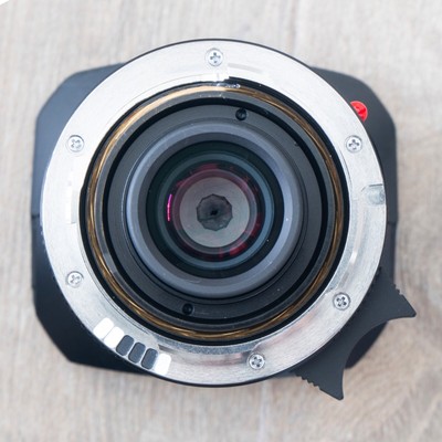 Mint Leica Elmarit-M 28mm f2.8 ASPH. Lens (MFR #11677) with box, pouch, & hood
