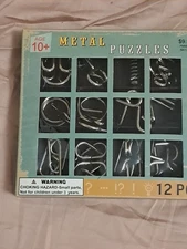 12 Piece Metal Puzzles Test Your Brain!