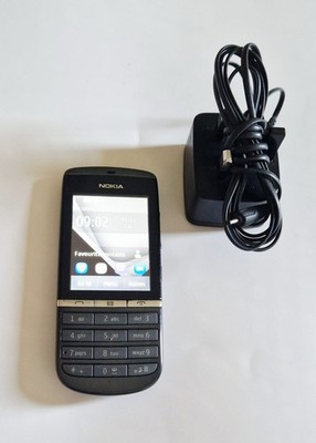 Nokia Asha 300 Smartphone (EE Network) - Graphite in gutem Zustand mit Ladegerät