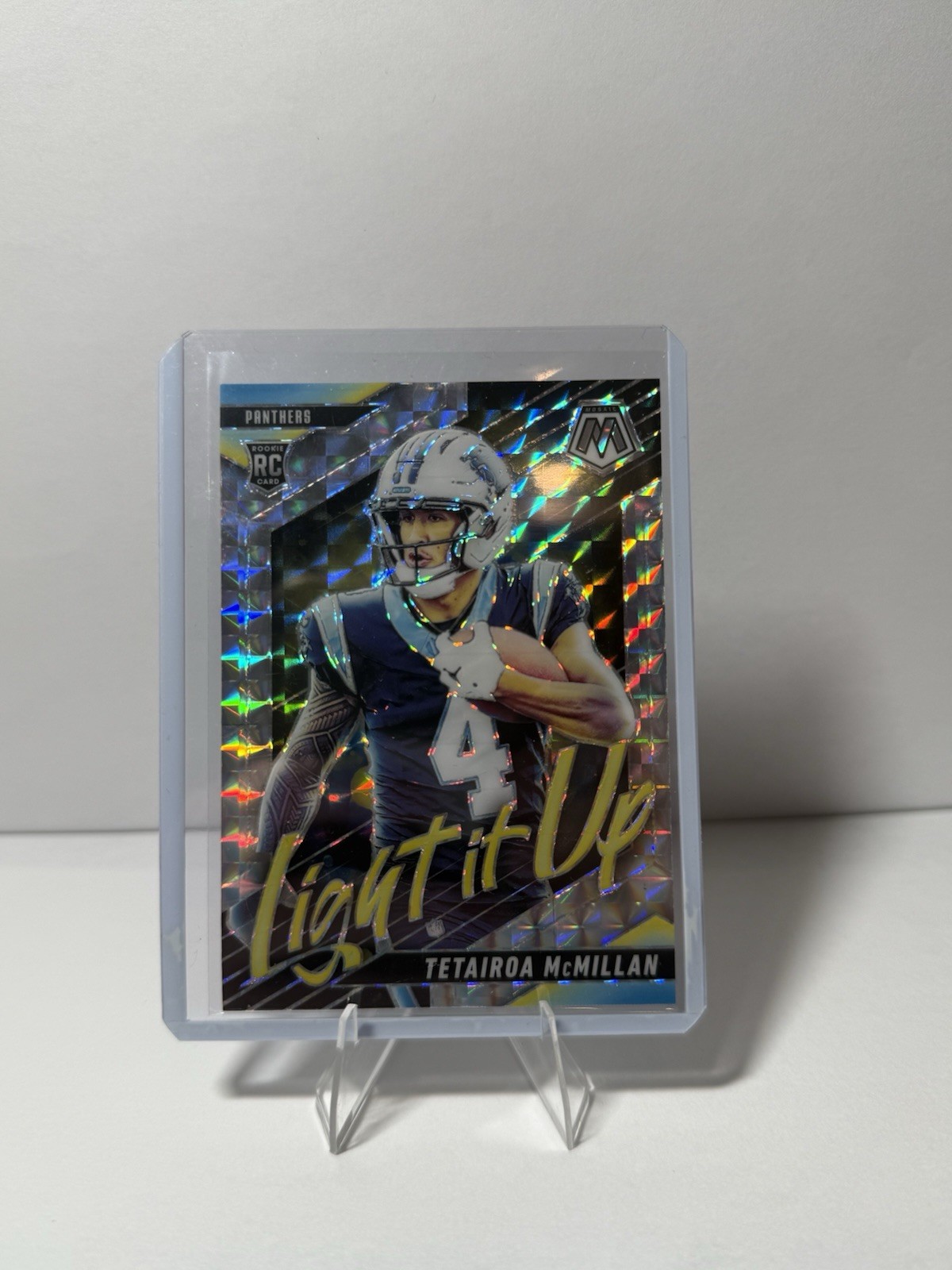 2025 Panini Mosaic #24 Tetairoa McMillan Light It Up Mosaic Silver RC