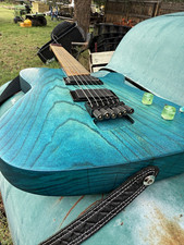 Headless telecaster style fanned fret Exotica Guitars . USA made