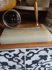Benchmark with Clock with Pen Holder