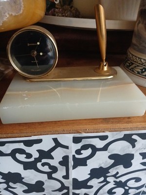 Benchmark with Clock with Pen Holder
