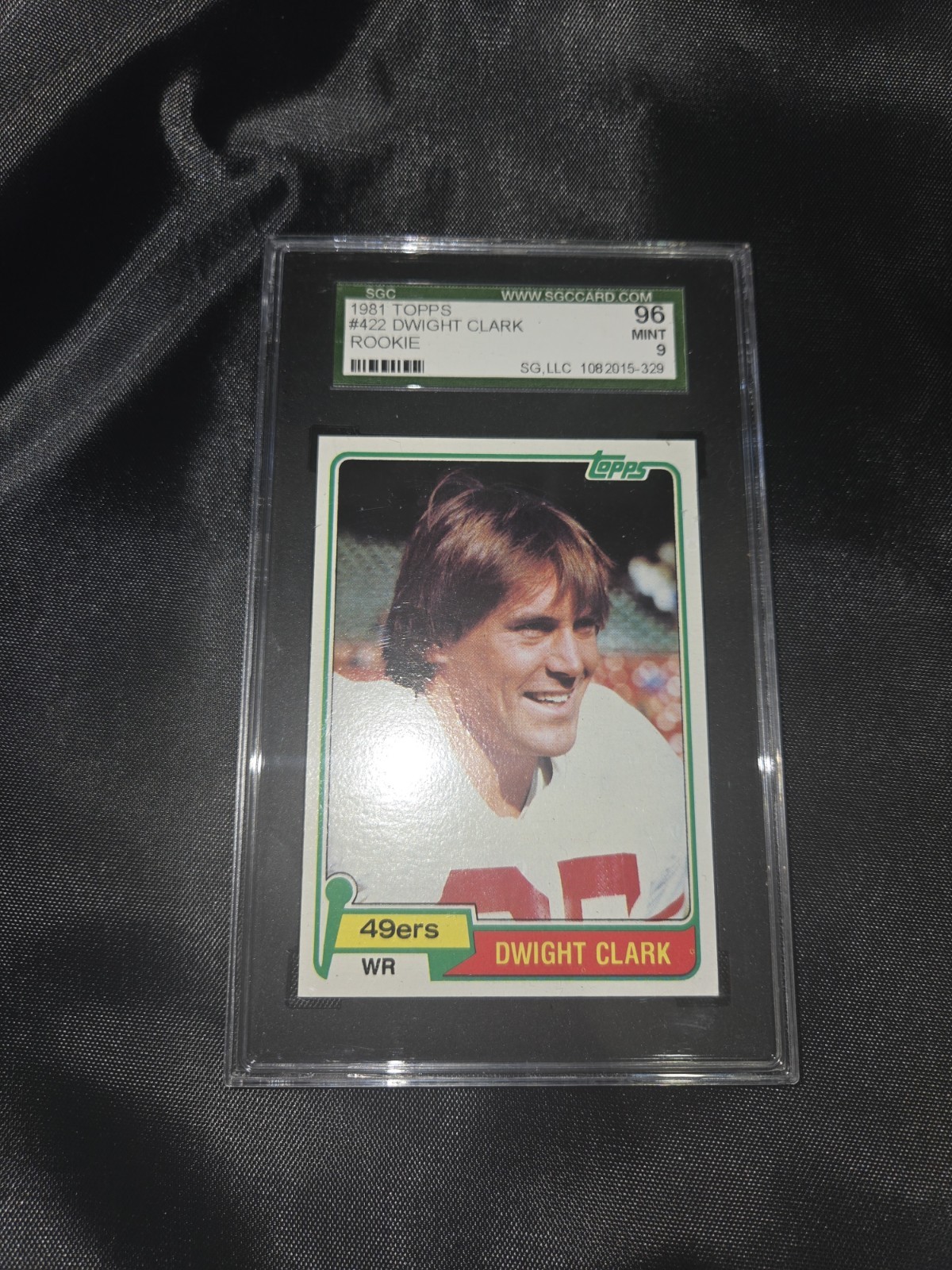 1981 Topps Football #422 Dwight Clark RC SGC 9 Mint San Francisco 49ers