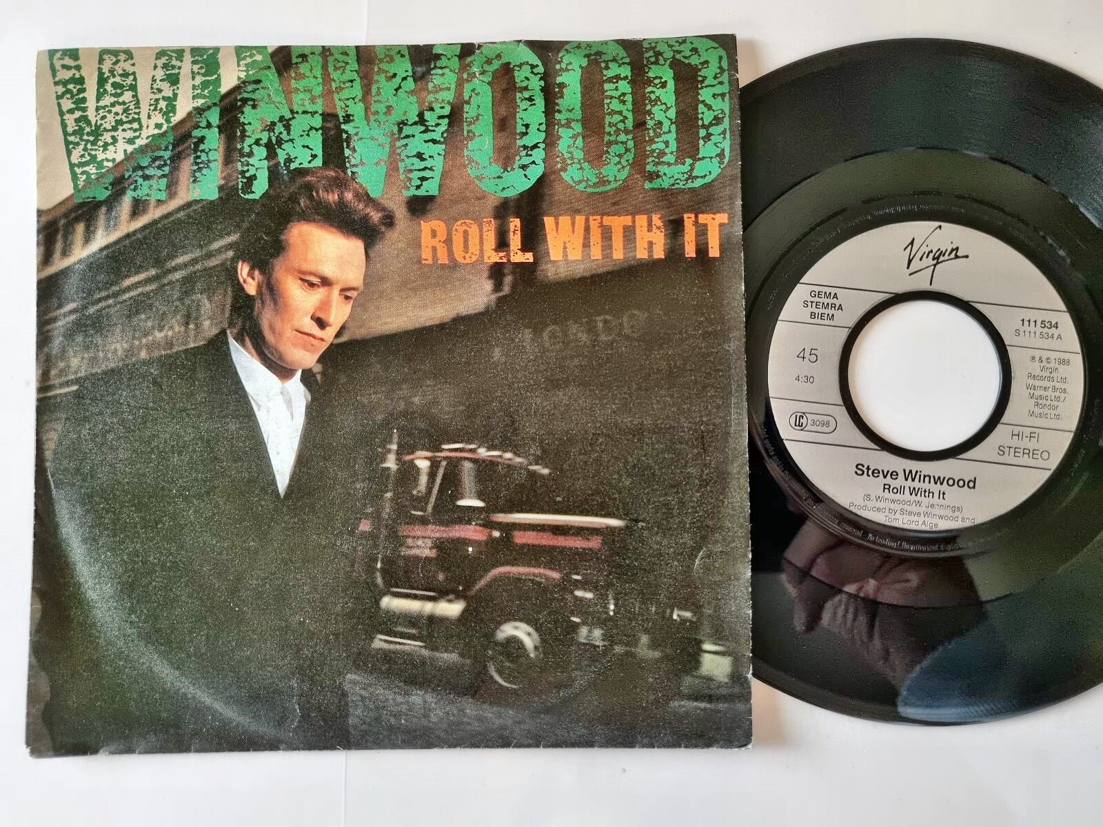 Steve Winwood - Roll with it 7'' Vinyl Germany