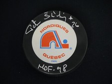 PETER STASTNY SIGNED QUEBEC NORDIQUES TEAM PUCK INSCRIBED 