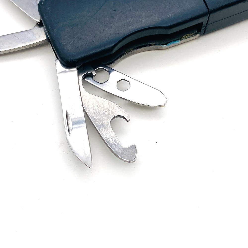 12-in-1 Multi Tool Folding Knife with Saw Blade Bottle Opener Screwdriver File
