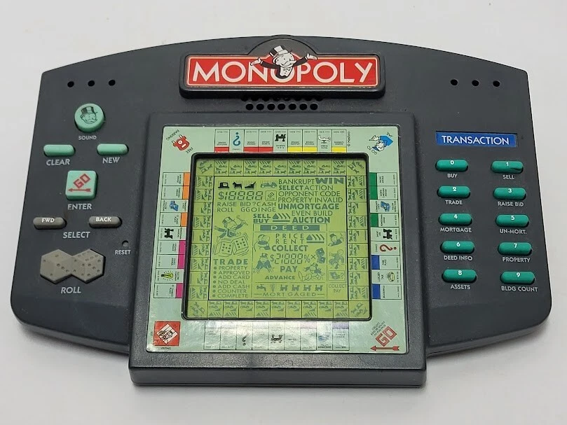 Lote de 4 juegos portátiles Monopoly Price Is Right Shaky Pinball & Shrek sin probar. Foto 2 de 4