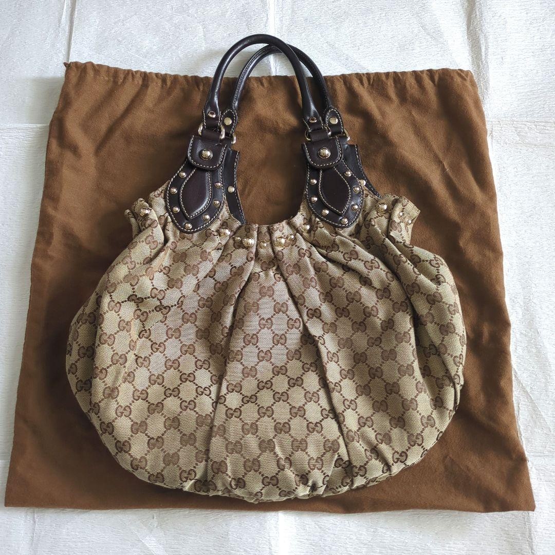 Gucci Beige Canvas Leather Shoulder Bag with Double Handles and Zipper Pocket