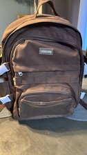 Leisure Brown Solid Polyester Zip Backpack Front Zip Pockets, Adjustable Strap