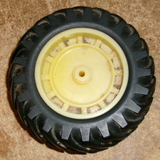 1/16 john deere 4.5"dia. x 1.75"W plastic rim rubber tractor tire good used