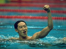 Daichi Suzuki of Japan makes raises his arm in victory after winni- Old Photo