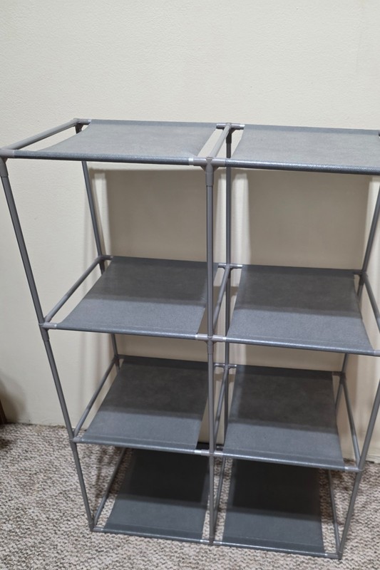 6 cube storage rack, new, cloth, metal rods , clean, organize, light weight