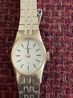 Vintage Seiko 11-7849 Gold Tone not currently working needs battery? extra links