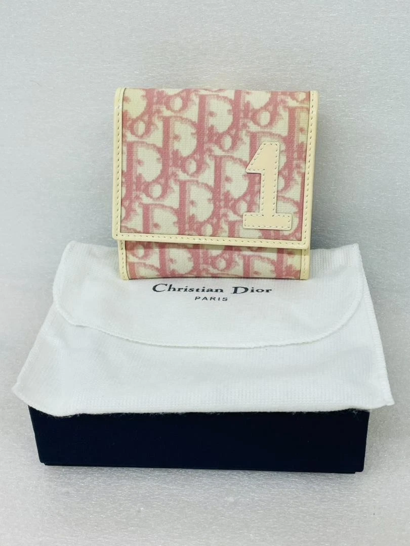 Portefeuille Christian Dior trotteur double pli numéro rose