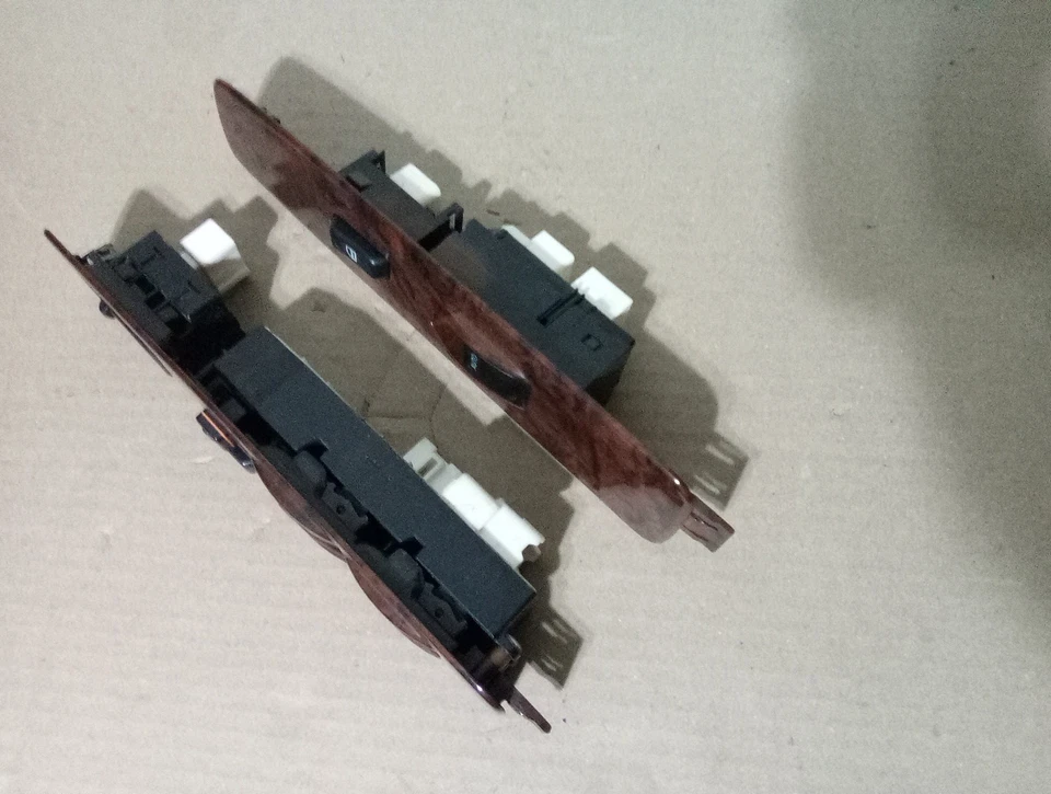 Interruptores ventana conductor y pasajero Toyota 4Runner 98-02 izquierda y derecha grano madera. Foto 3 de 4