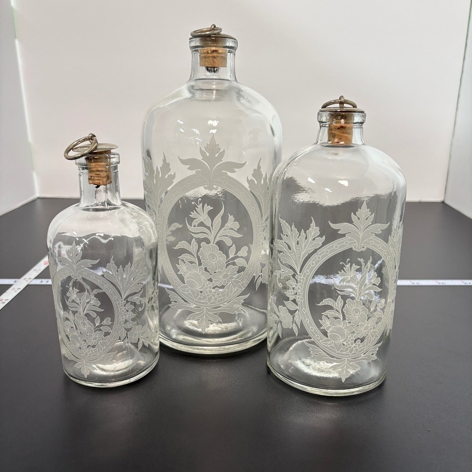 Vntge Glass Bottles Set of 3 Clear Etched Floral Medallion Apothecary MCM Vellum
