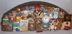 Russian Soviet Military Pins and Badges on a Army Hat Collection