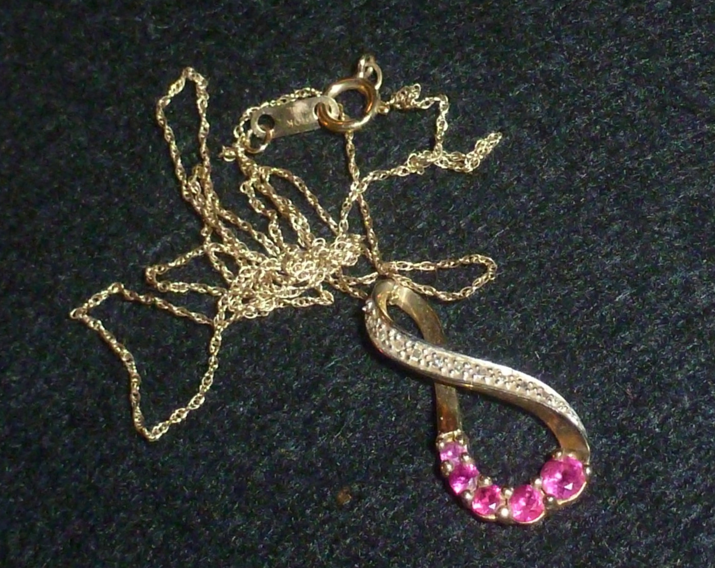 10K SOLID YELLOW GOLD RUBY/DIAMOND ACCTED INFINIT… - image 1