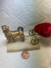 antique pug dog pulling a chariot with a pillow — photo 1
