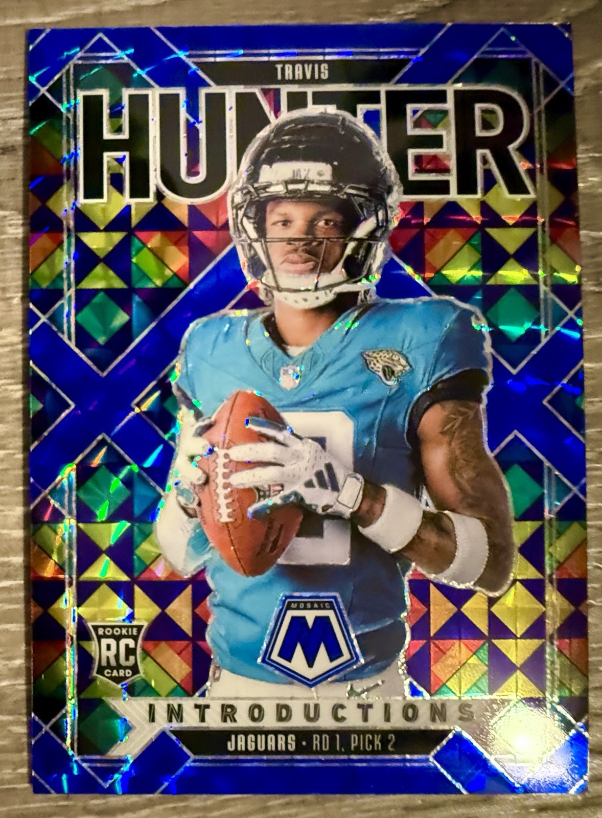2025 Panini Mosaic Rookie RC Travis Hunter Introductions Blue Prizm /99 Jaguars