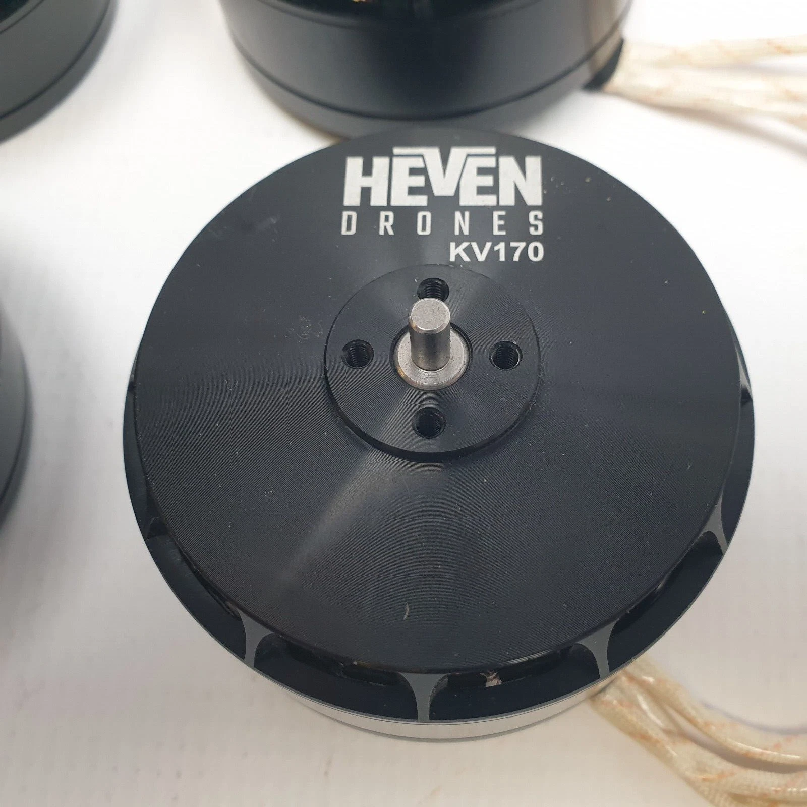 Top of a Heven Drones KV170 motor with center shaft and 4-hole mount