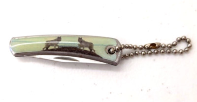 Folding Knife with Wolf artwork on handle