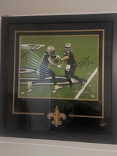 drew brees and alvin kamara autographed picture.